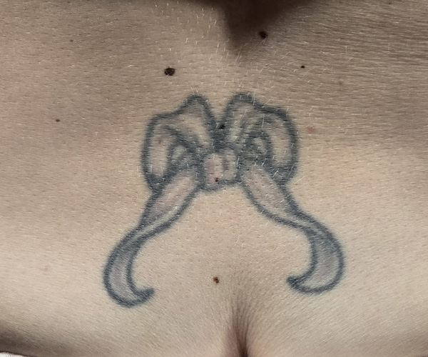 ribbon tattoo before fix up